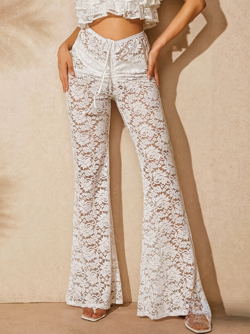 Pantalones transparentes de encaje