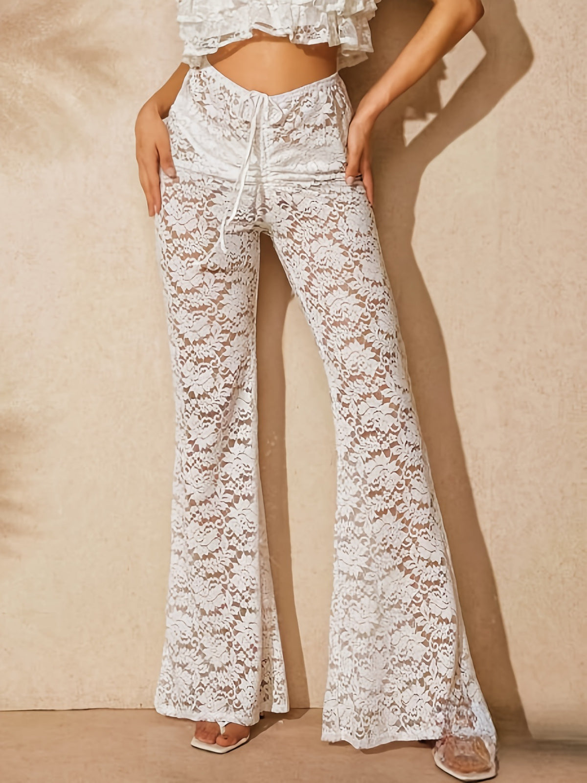 Pantalones transparentes de encaje